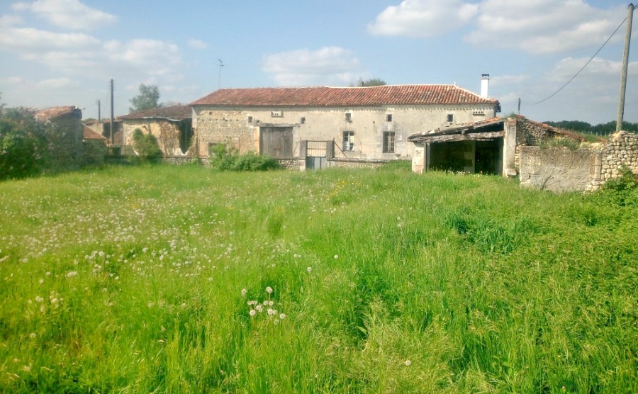 Karen and her husband have bought a traditional farmhouse with lots of outdoor space and a large barn to completely make their own.