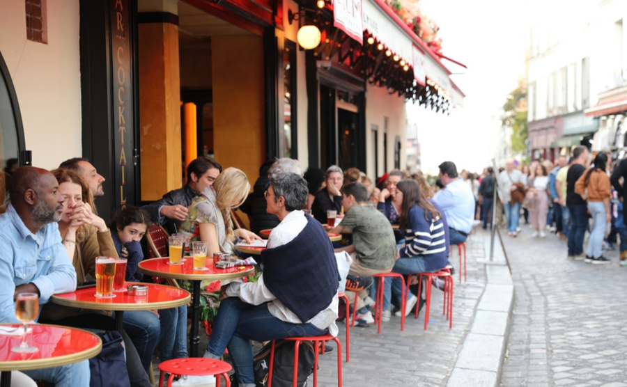 people drinking at a paris bar