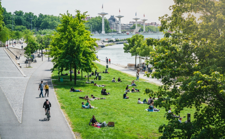 People enjoy the sun in the first weekend since the easing of lockdown measures. Keitma / Shutterstock.com