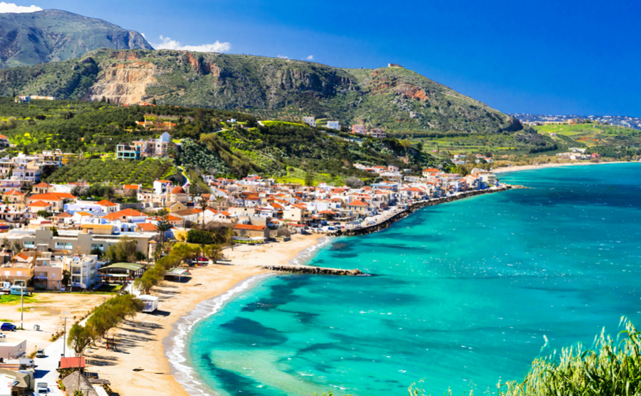 Where to buy in Greece? Kalyves in Crete has beautiful beaches and a number of good cafés and restaurants.