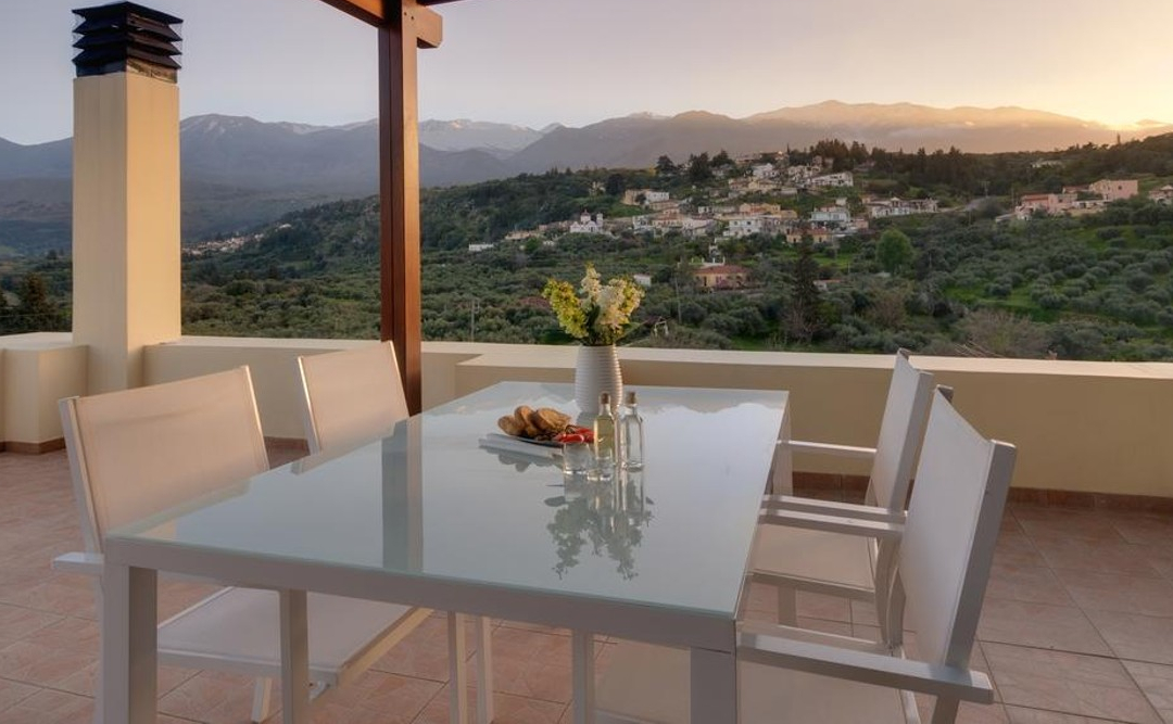 outside table & chairs, mountain views.