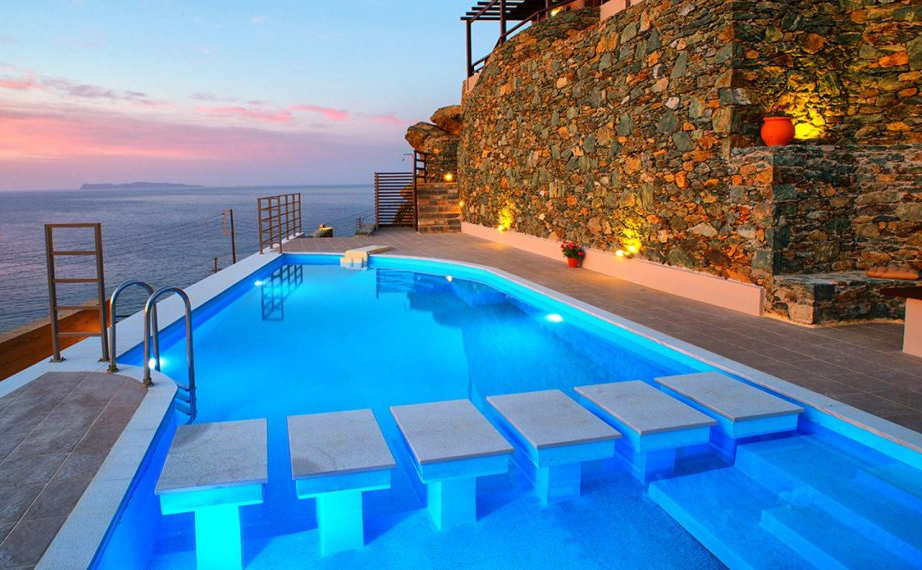 swimming pool and stone house