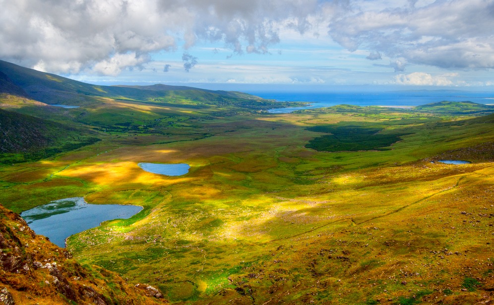 Sunny mountain and lake landscape on Dingle peninsula, Ireland