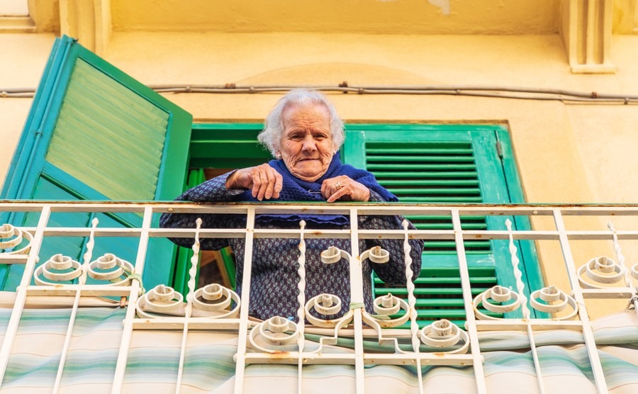 Italians have been socialising across their balconies. Emily Marie Wilson / Shutterstock.com