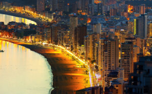 Benidorm lit up in the dark of night.