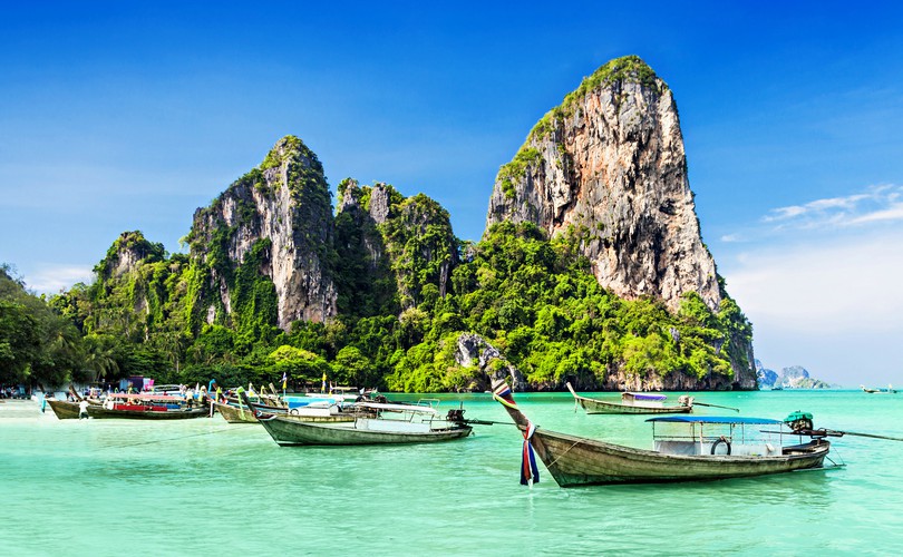 longtale-boats-at-the-beautiful-beach-thailand