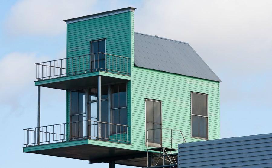 tiny-house-at-the-top-of-a-bigger-building