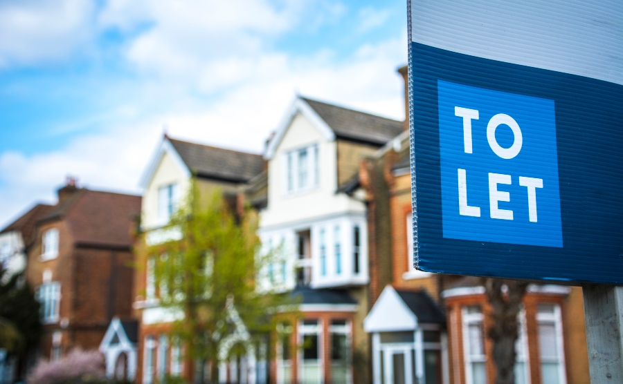 Houses with a 'To Let' sign to the right