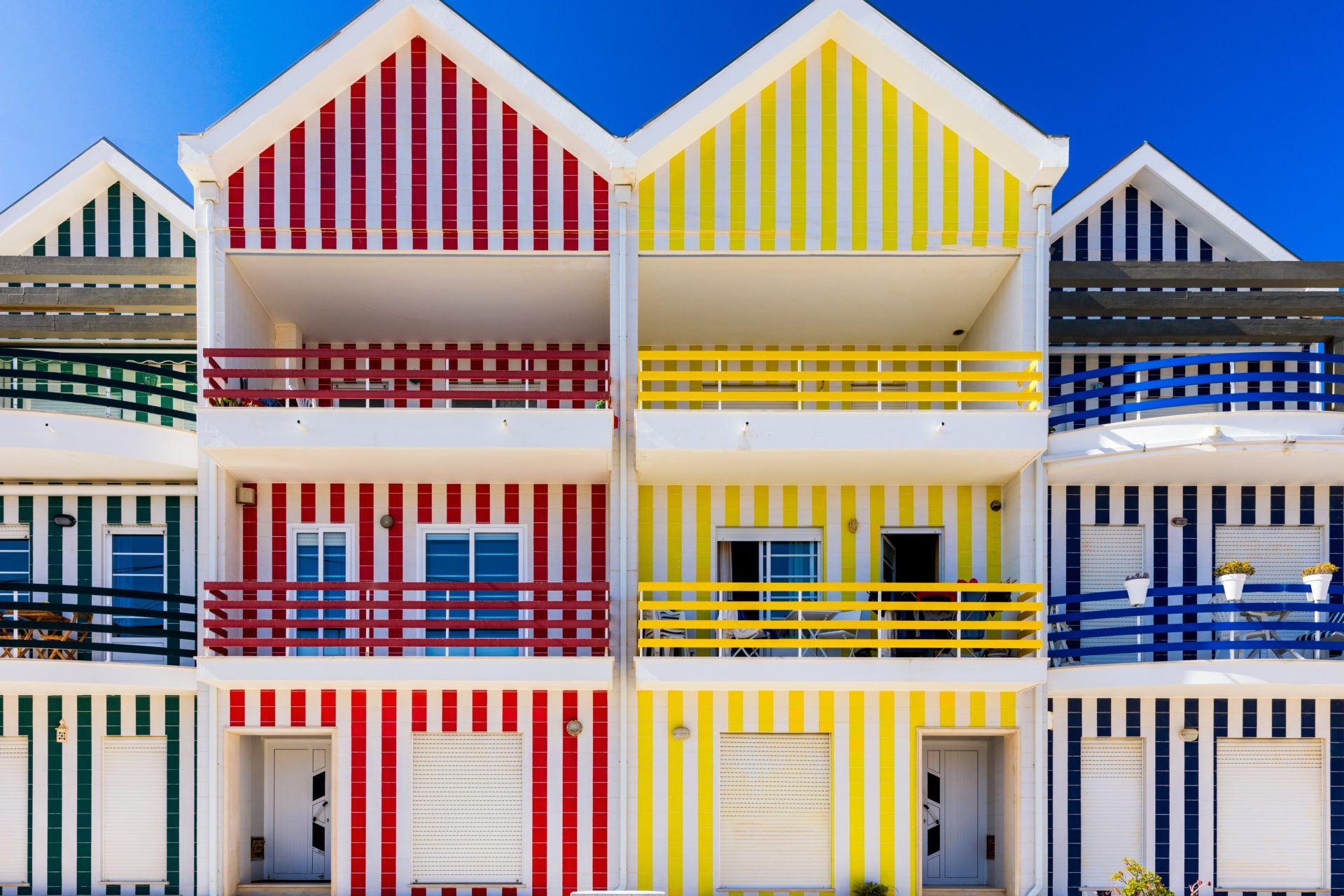 Facades of colorful houses in Costa Nova, Aveiro, Portugal.