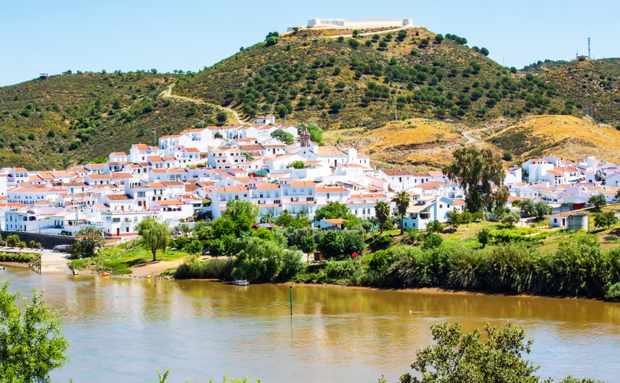 View from Alcoutim in Portugal to Sanlucar de Guadiana in Spain, borderline and medieval castle