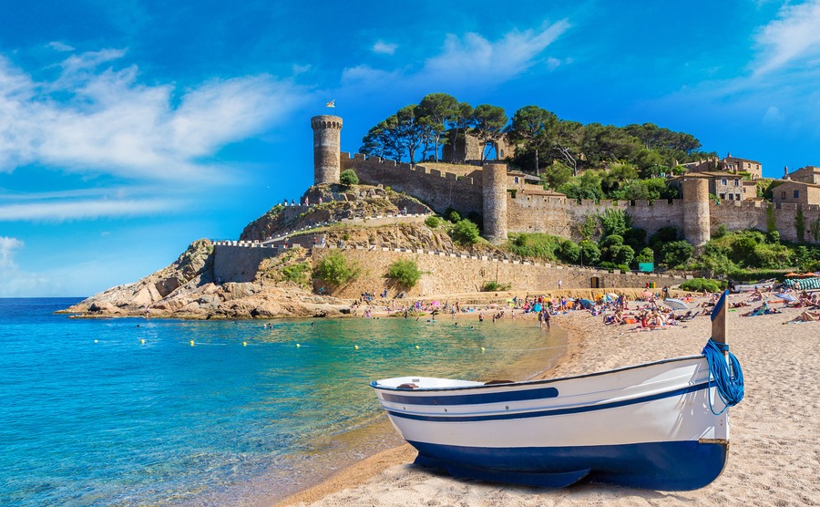 Beach at Tossa de Mar and fortress in a beautiful summer day, Costa Brava, Catalonia, Spain
