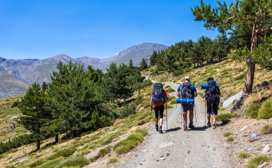 Make the most of the cooler weather and explore the great outdoors, like this trio heading to the Mulhacén.