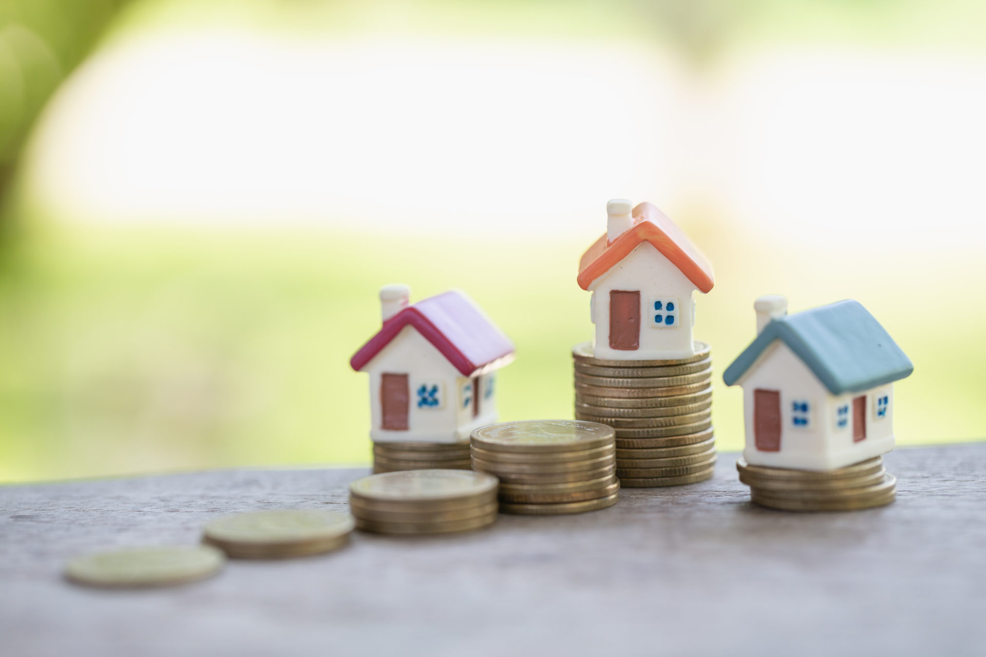 Houses on a stack of money