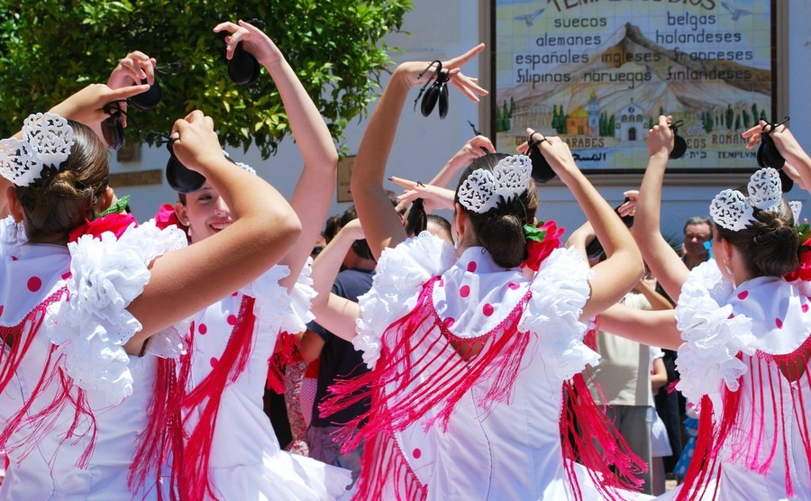 marbella-spain-june-11-2008-teenage-girls-flamenco-dancing-in-the-street-during-the-romeria-san-bernabe-religious-festival-marbella-june-11-2008