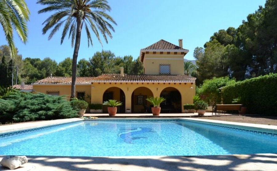 19th-century villa with spacious gardens and pool for €970,000.