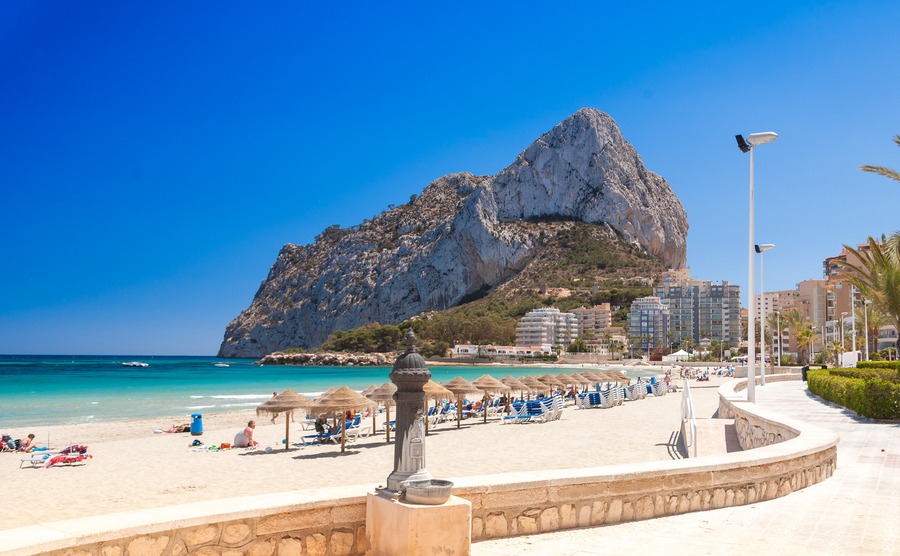 Sand beach and Natural Park of Penyal d'Ifac on background, Calpe, Spain