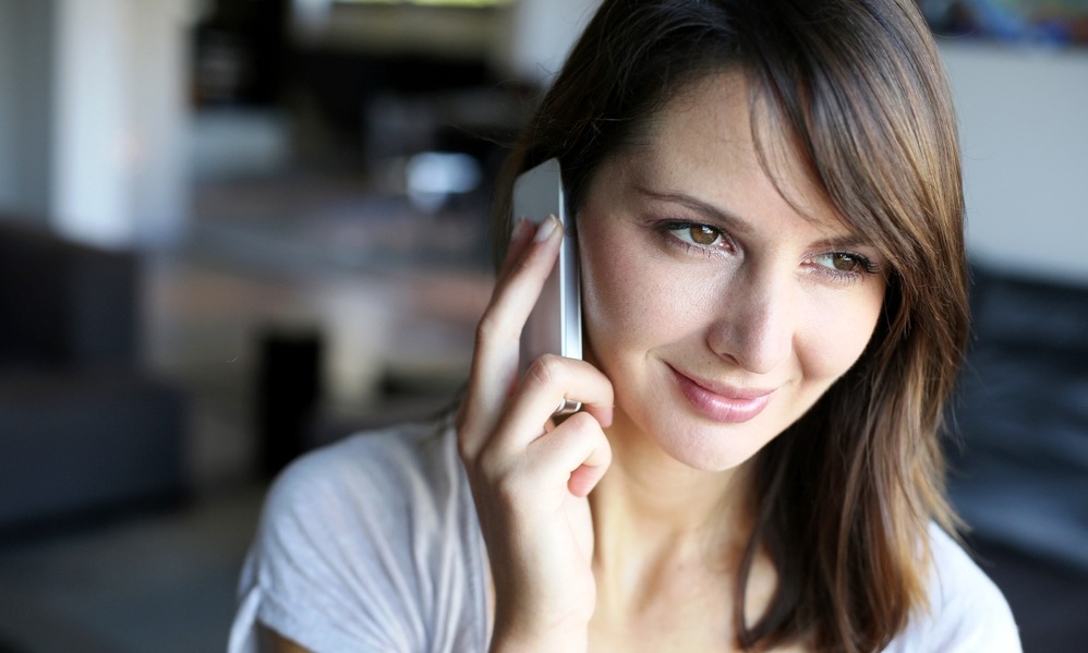 Spain - Woman talking on her mobile phone