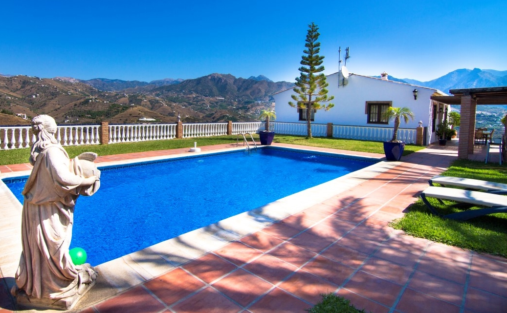 swimming pool with mountain views