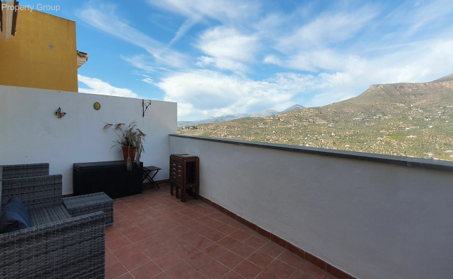 terrace with views of the mountains.