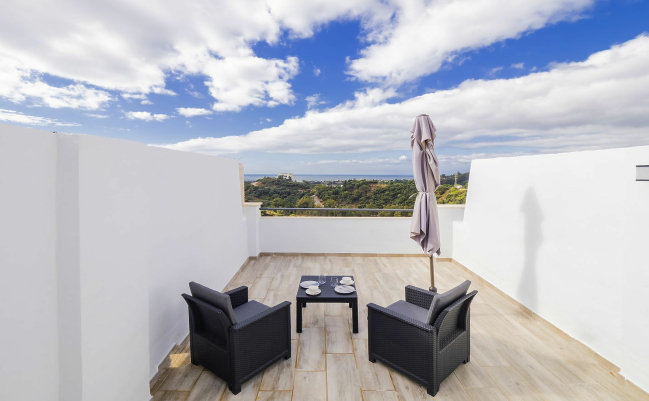 chairs on a terrace, Spain. 