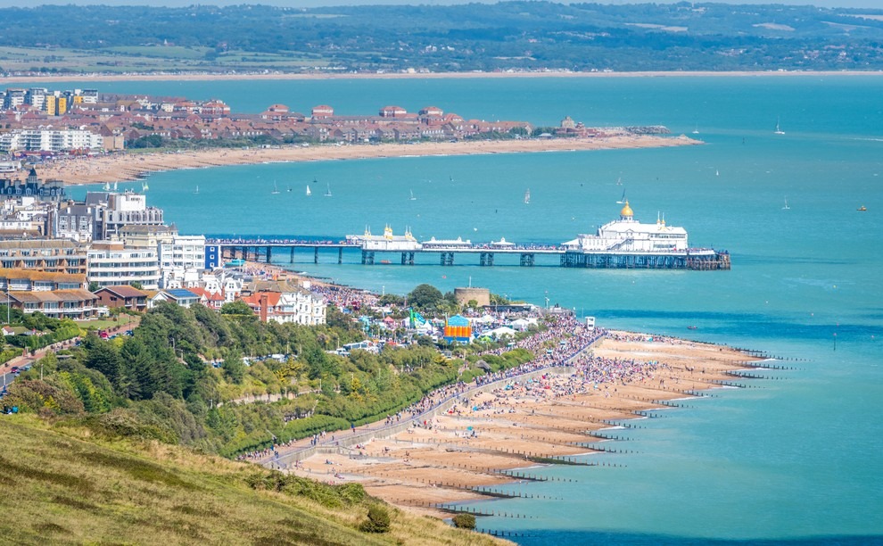 Aerial view over Eastbourne seafront and pier from Beachy Head 