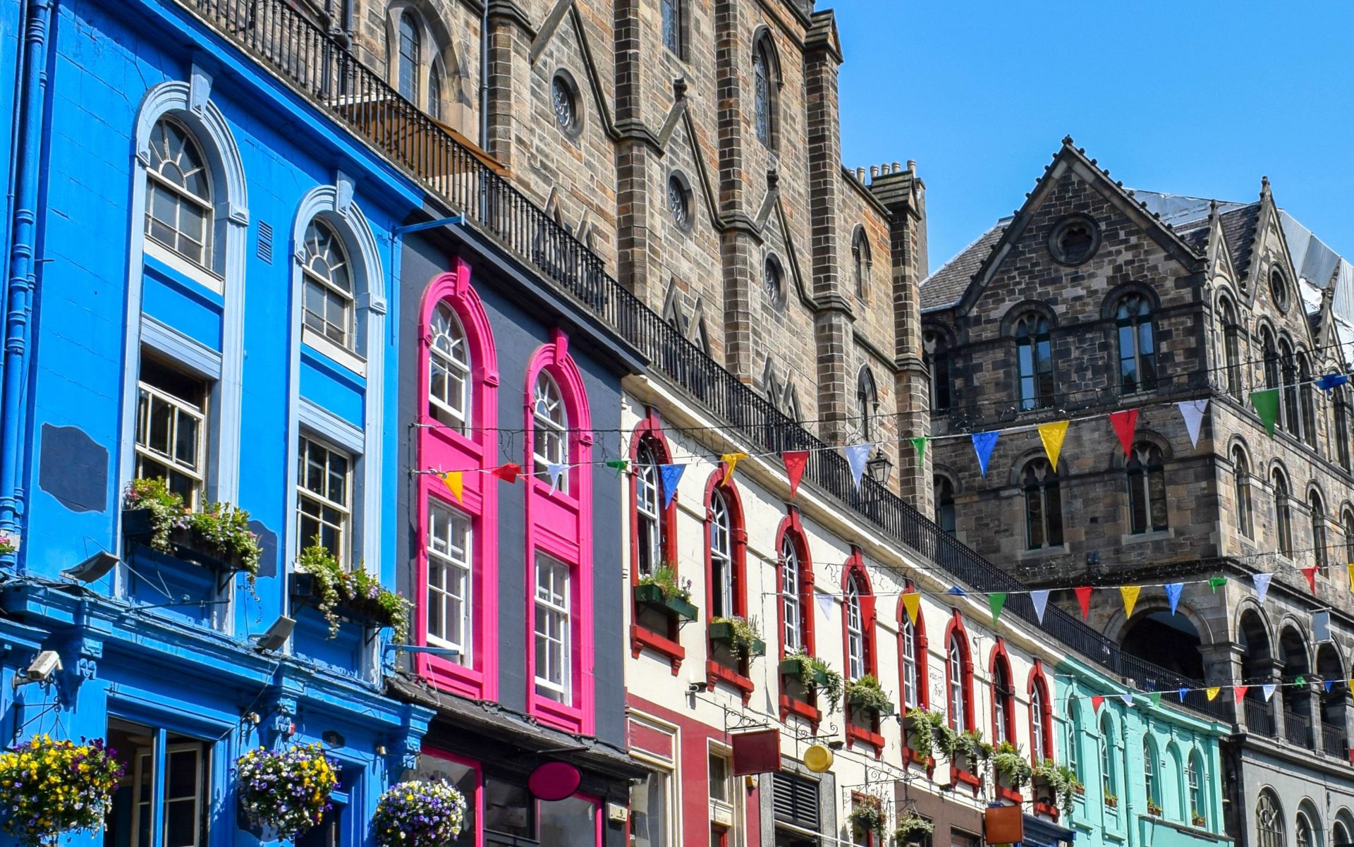 Colourful houses on Victoria Street in Edinburgh, a popular location for those deciding where to buy property in the UK