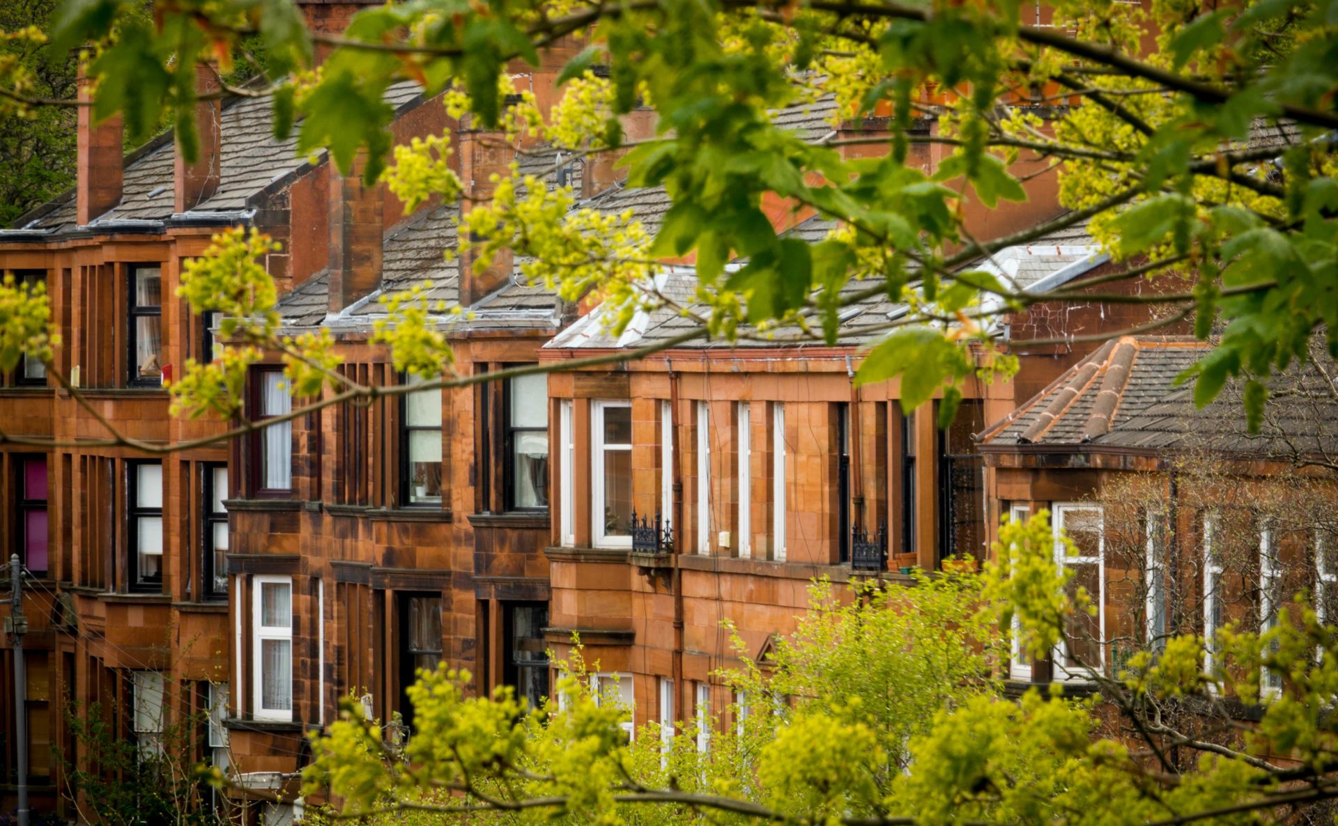 Sandstone terraces in Glasgow – a typical kind of property for those considering where to buy property in the UK