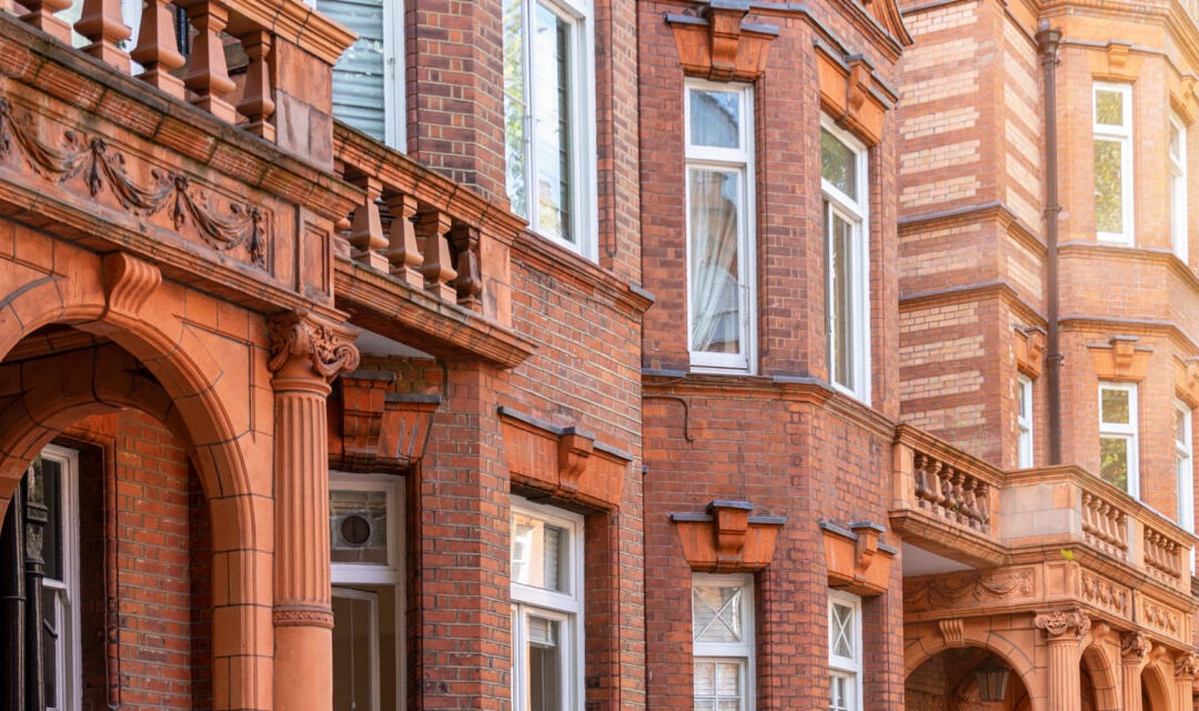 What should you consider when buying a flat in the UK or Ireland?