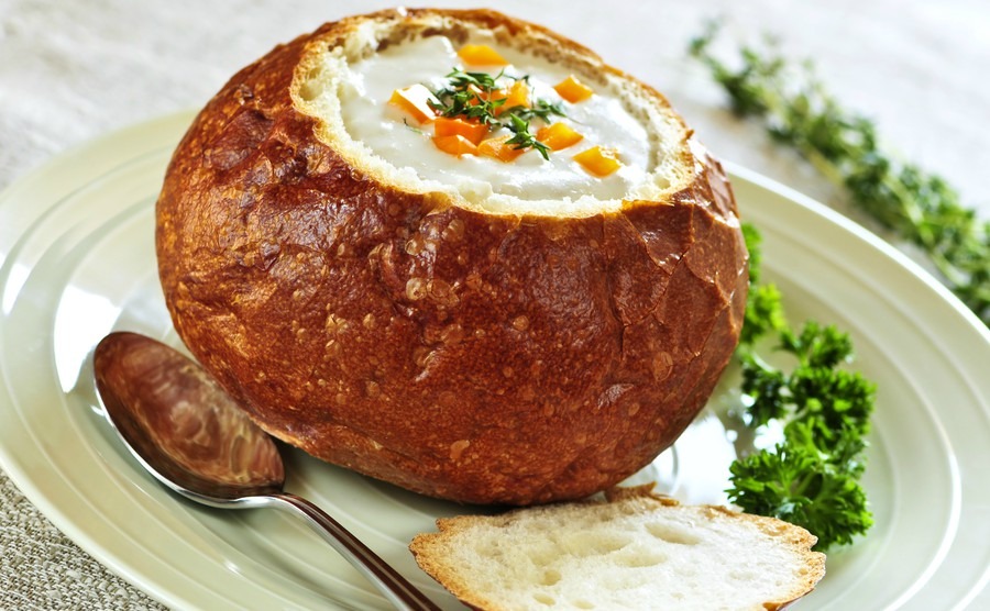 lunch-of-soup-served-in-baked-round-bread-bowl