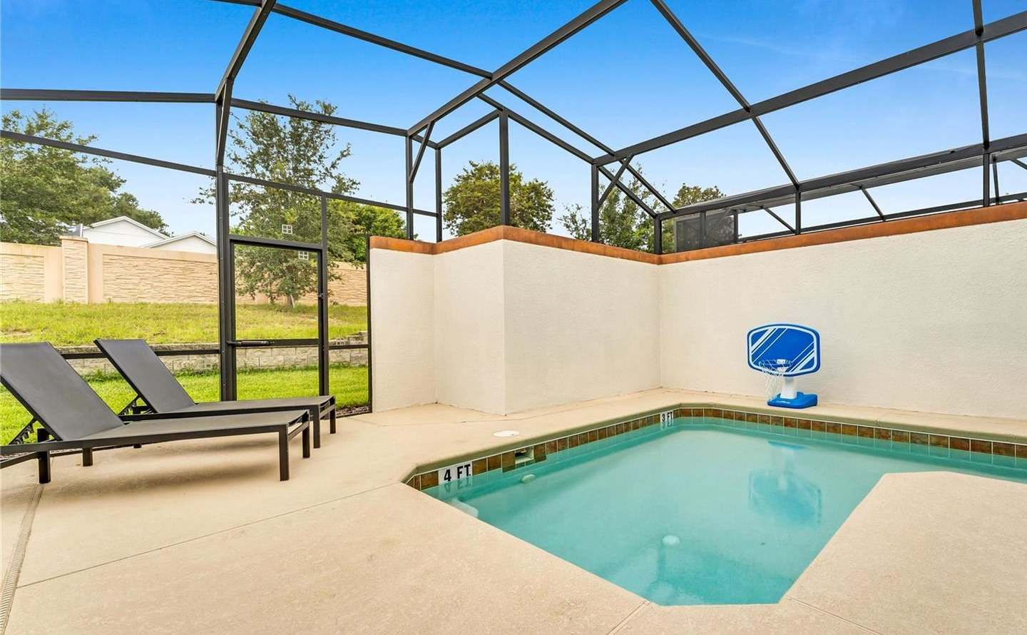 swimming pool and deck chairs. 