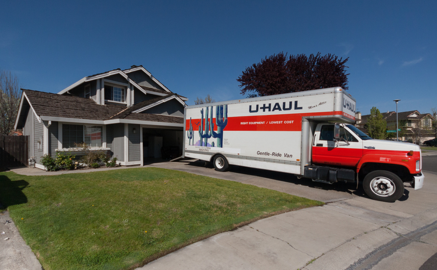 U Haul moving truck in front of a house ready to move in new occupants